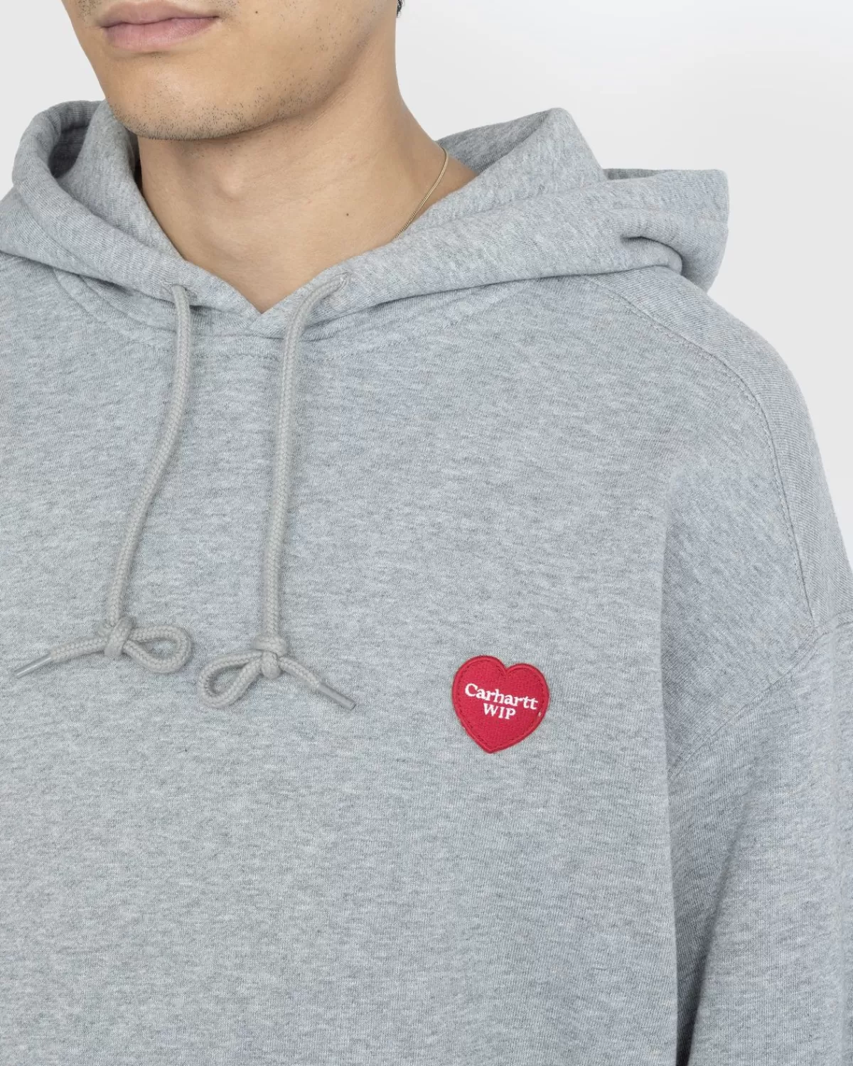 carhartt_wip_hartsweater_met_capuchon_grijs_gemeleerd_1.webp Gebreide Kleding^Carhartt WIP Hartsweater Met Capuchon Grijs Gemeleerd