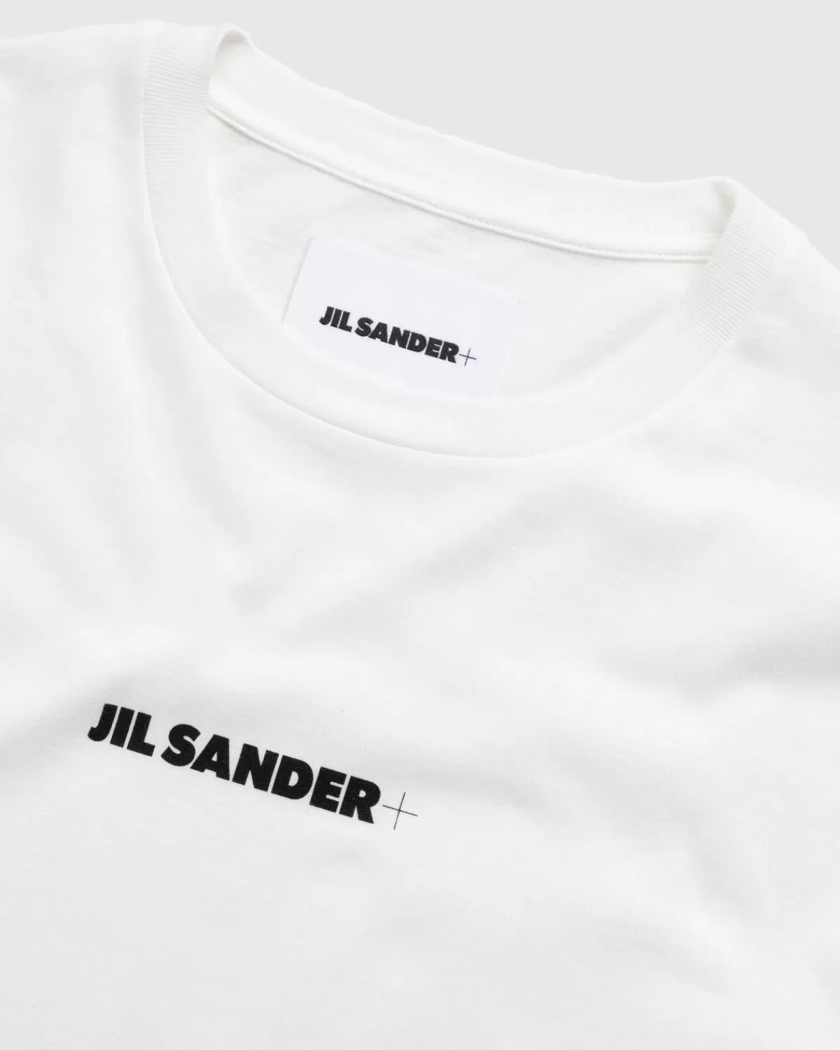 jil_sander_logo_tshirt_met_lange_mouwen_porselein_wit_2.webp Jil Sander Logo T-Shirt Met Lange Mouwen Porselein Wit Clearance